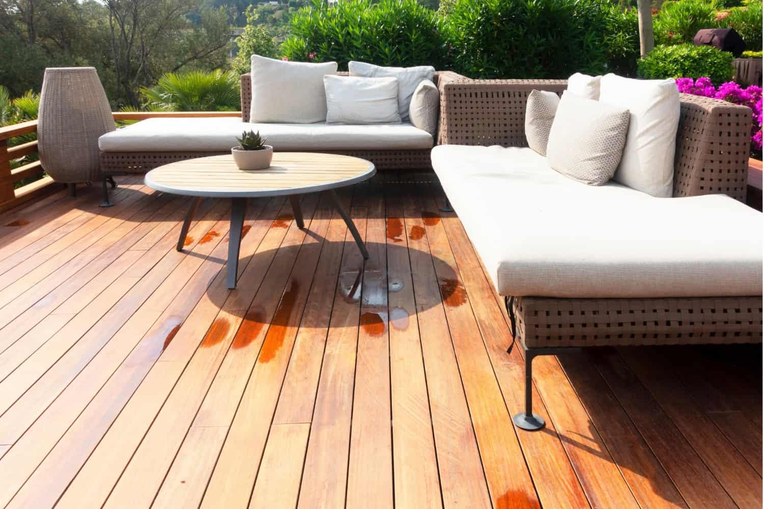 sunny patio with outdoor furniture and cushions