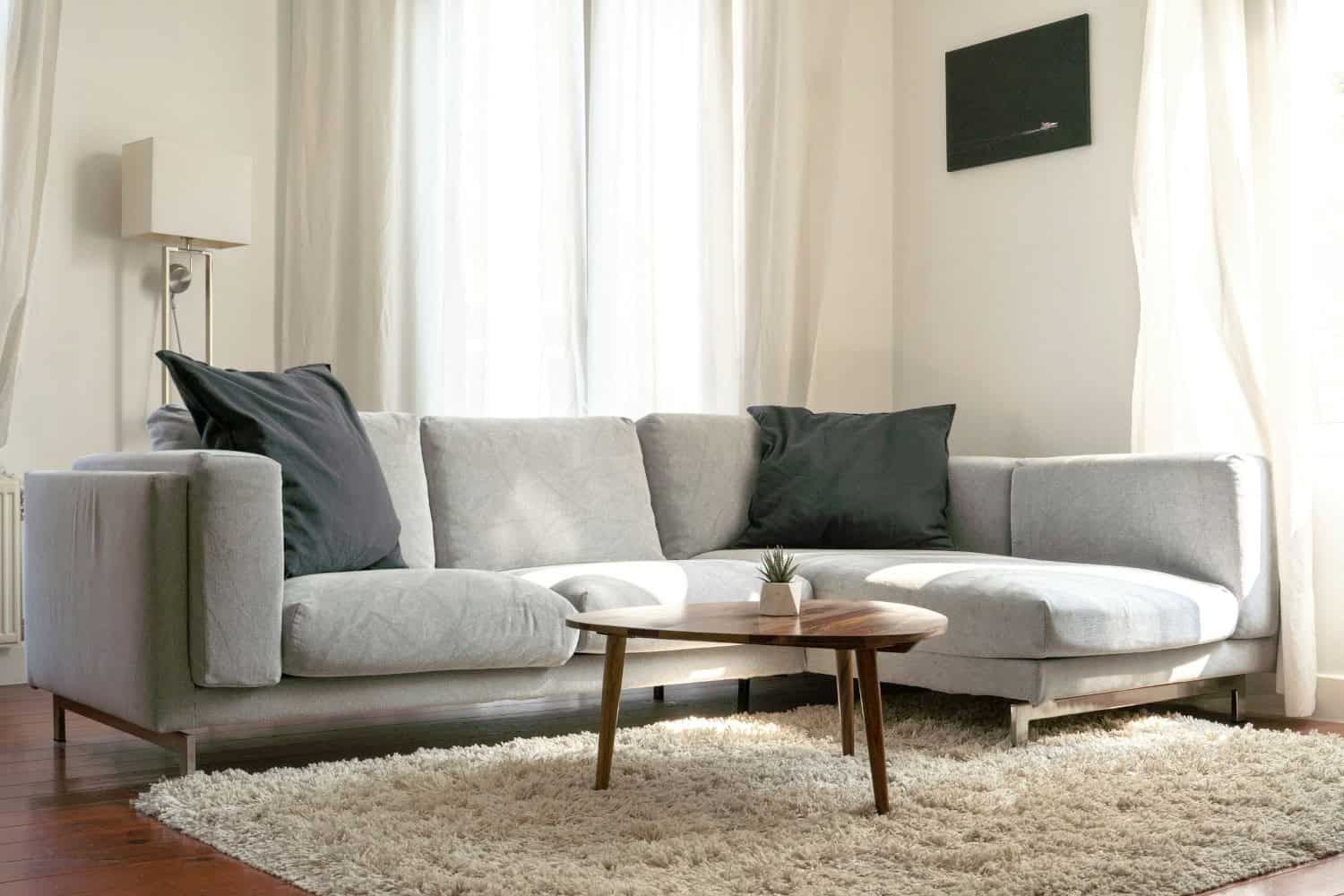 Living room with square-shaped sofa cushion and coffee table