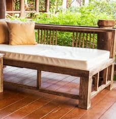 Tan Bench cushion on Wooden Bench Outside